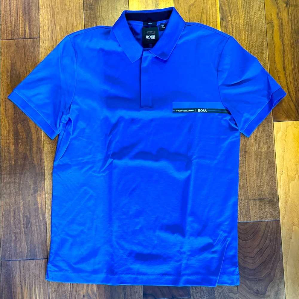BOSS / Porsche polo / golf shirt.  Blue, size medium.  Brand new with tags.